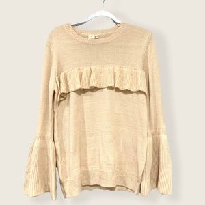 Cream Sweater with bell sleeve.